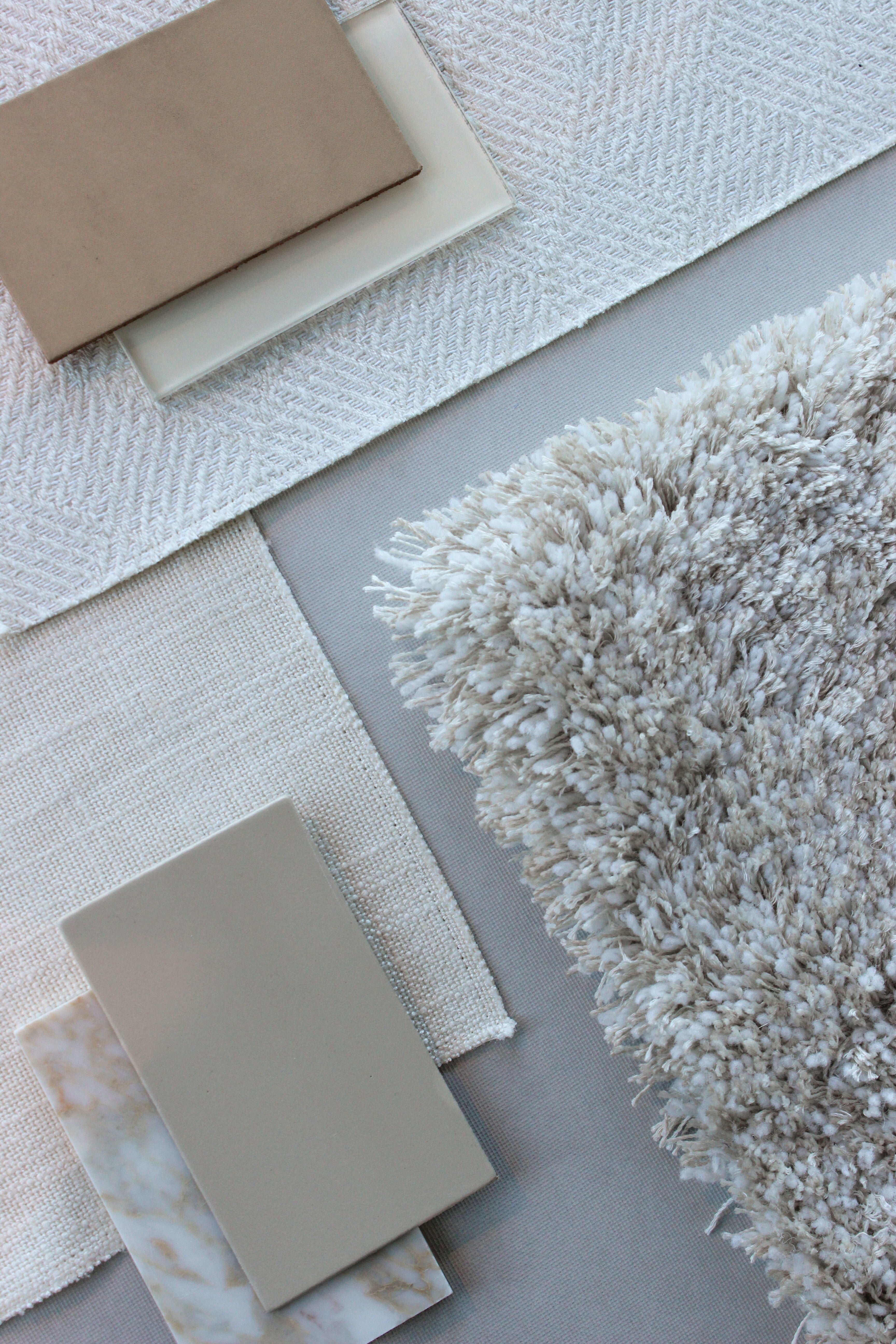 Moodboard At Ease in soft beige showing eucalyptus and wool, 35 mm pile