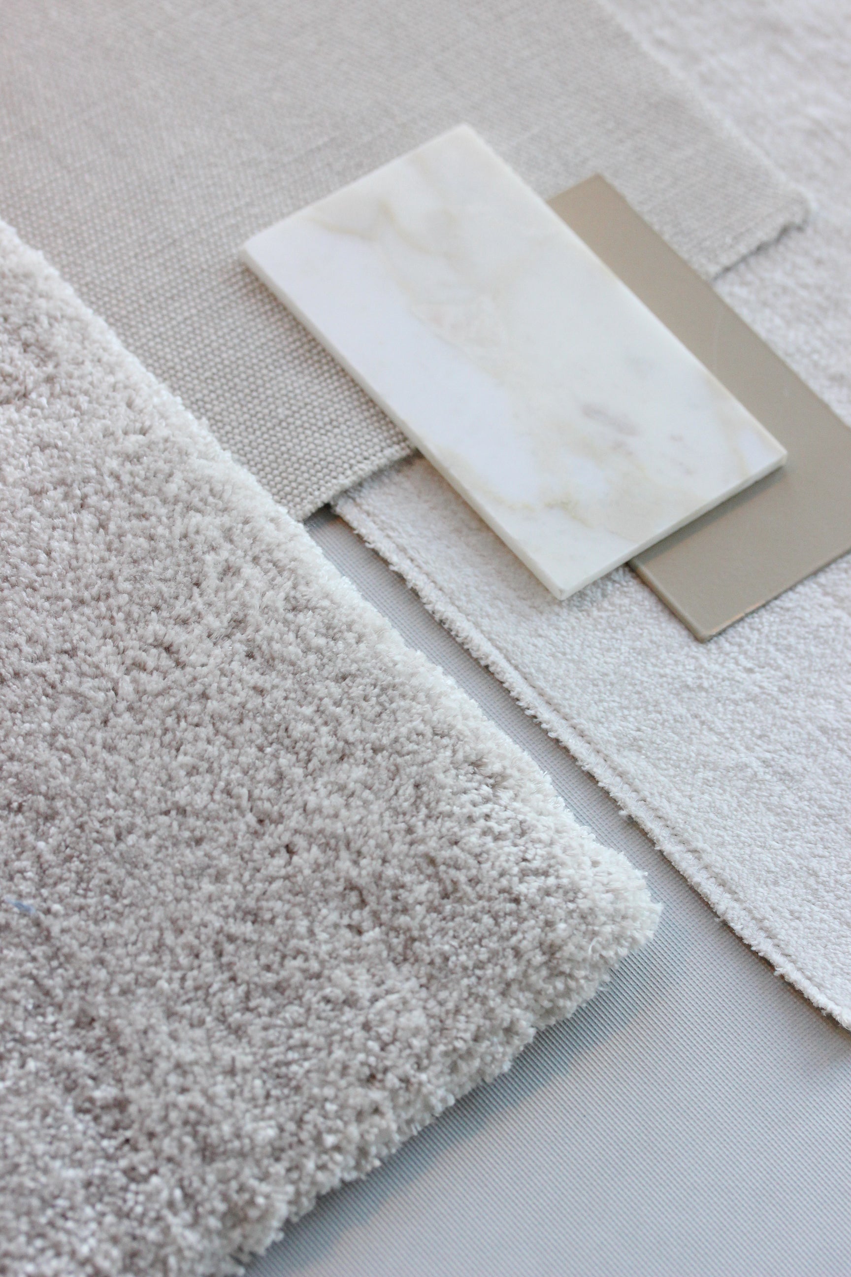 Close-up moodboard of Move Slow rug showing eucalyptus yarn texture and pile height
