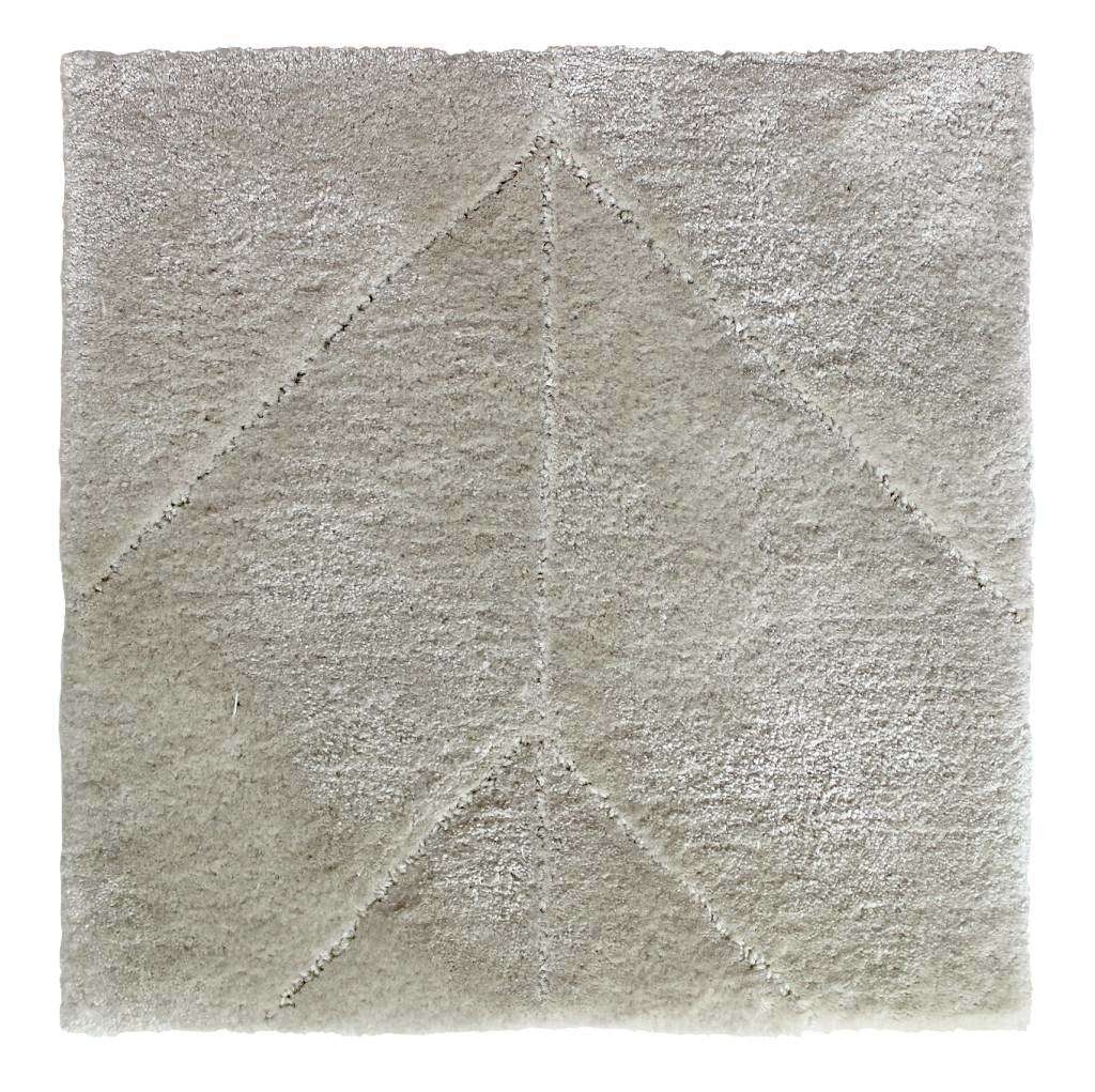 chasing light rug hand tufted in eucalyptus and wool, 10 mm pile, soft beige
