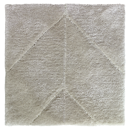 chasing light rug hand tufted in eucalyptus and wool, 10 mm pile, soft beige