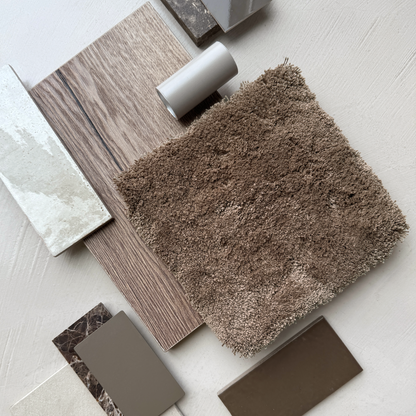 Collection of brown and beige textured samples on a light surface